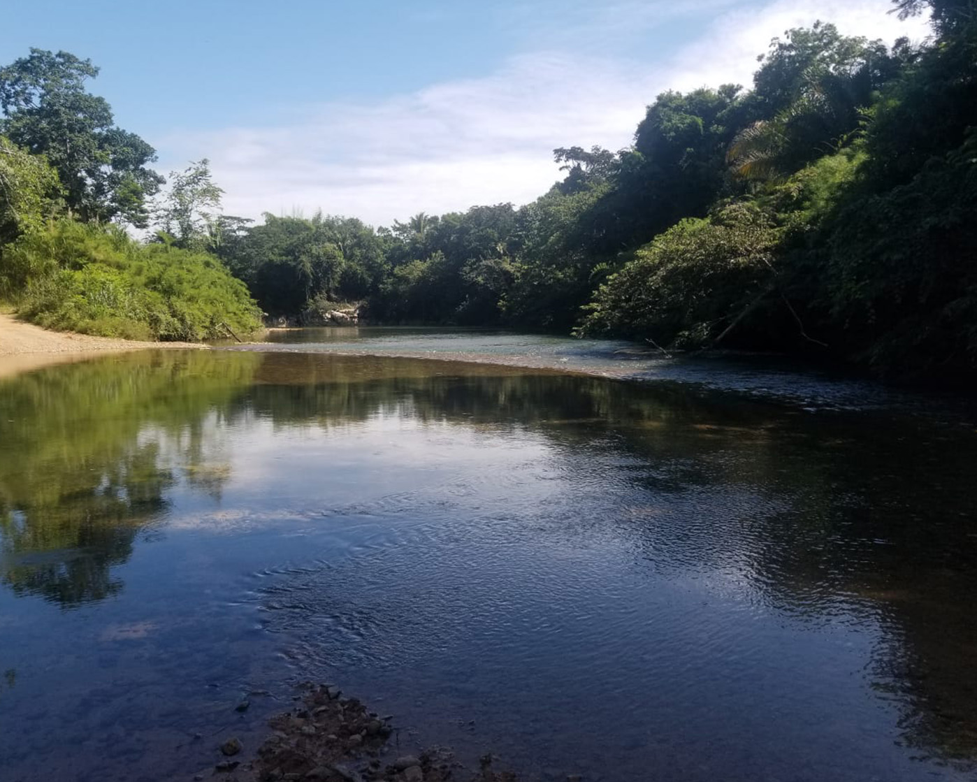 Image of river bend beach on property for sale in belmopan area, Belize.