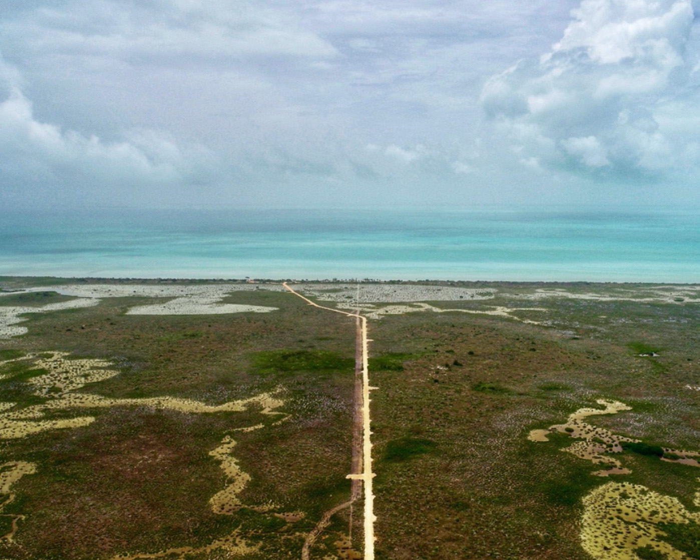 Image of walking path to ocean beach on property for sale in Belmopan, Belize.